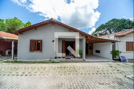 Fachada de casa de condomínio para alugar com 2 quartos, 75m² em Viamópolis, Viamão