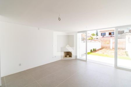 Sala de casa à venda com 3 quartos, 180m² em Ipanema, Porto Alegre