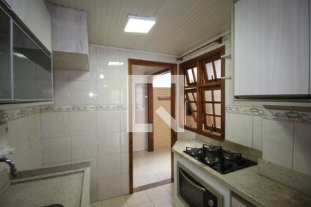 Cozinha de casa de condomínio à venda com 3 quartos, 80m² em Humaitá, Porto Alegre