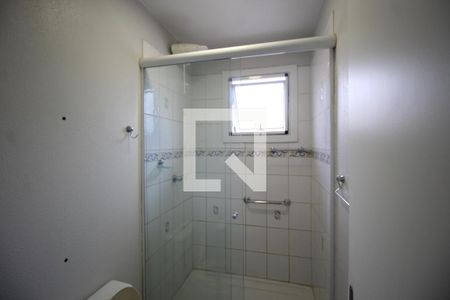 Banheiro de casa de condomínio à venda com 3 quartos, 80m² em Humaitá, Porto Alegre