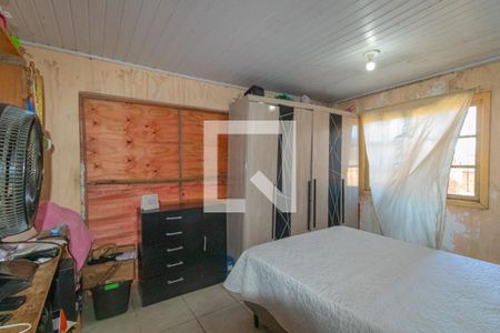Quarto 1 de casa à venda com 4 quartos, 140m² em Guajuviras, Canoas