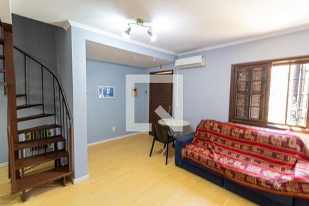 Sala de casa de condomínio à venda com 3 quartos, 90m² em Vila Nova, Porto Alegre