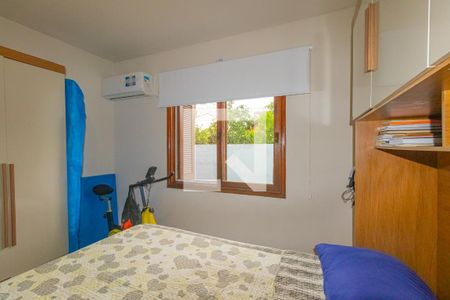 Quarto 1 de casa de condomínio à venda com 2 quartos, 42m² em Harmonia, Canoas