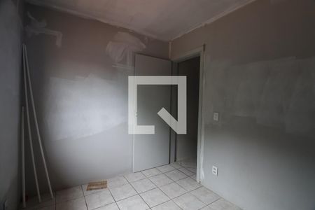 Quarto 1 de casa de condomínio à venda com 2 quartos, 46m² em Rio Branco, Canoas