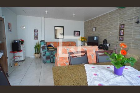 Sala  de casa à venda com 4 quartos, 128m² em Vila Nova, Porto Alegre