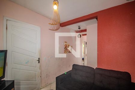 Sala de casa de condomínio para alugar com 3 quartos, 99m² em Guarujá, Porto Alegre