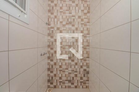 Banheiro da Suíte 1 de casa de condomínio à venda com 3 quartos, 121m² em Mário Quintana, Porto Alegre