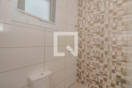 Banheiro da Suíte 1 de casa de condomínio à venda com 3 quartos, 121m² em Mário Quintana, Porto Alegre