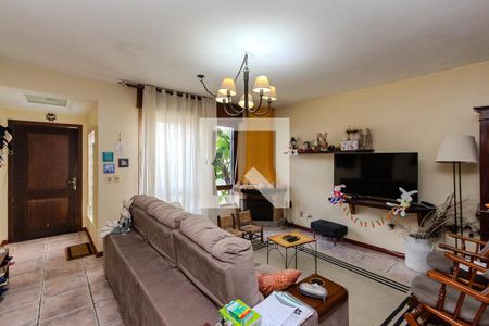 Sala de casa de condomínio à venda com 3 quartos, 200m² em Santo Antônio, Porto Alegre