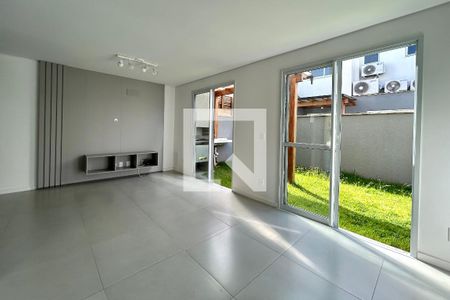 Sala  de casa de condomínio para alugar com 3 quartos, 115m² em Morro das Pedras, Florianópolis