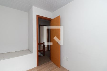 Quarto 1 de casa de condomínio para alugar com 2 quartos, 84m² em Restinga, Porto Alegre