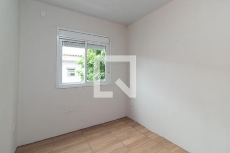 Quarto 1 de casa de condomínio para alugar com 2 quartos, 84m² em Restinga, Porto Alegre