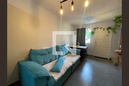 Sala de casa de condomínio à venda com 2 quartos, 105m² em Canudos, Novo Hamburgo