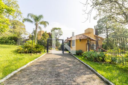 Fachada de casa de condomínio à venda com 3 quartos, 240m² em Cavalhada, Porto Alegre