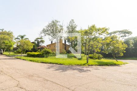 Fachada de casa de condomínio à venda com 3 quartos, 240m² em Cavalhada, Porto Alegre
