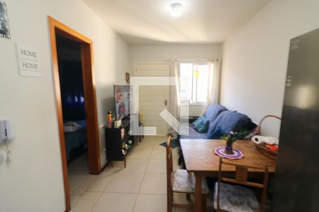 Sala de casa de condomínio à venda com 2 quartos, 49m² em Hípica, Porto Alegre