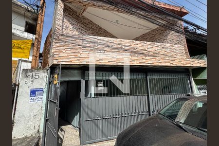 Fachada com Placa de casa para alugar com 2 quartos, 60m² em São Pedro, Osasco