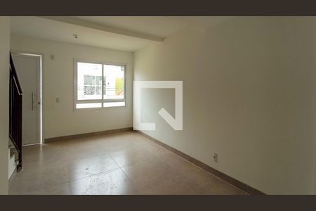 Sala  de casa de condomínio para alugar com 2 quartos, 60m² em Vila Nova, Porto Alegre