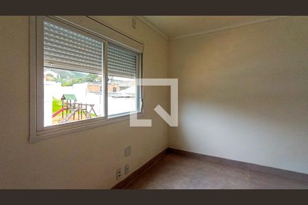 Quarto 1 de casa de condomínio para alugar com 2 quartos, 60m² em Vila Nova, Porto Alegre