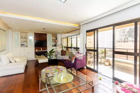 Sala com móveis modernos e decoração minimalista, com vista para a cidade. de apartamento à venda com 4 quartos, 195m² em Jardim Paulista, São Paulo