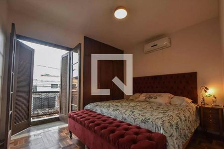 Quarto com cama de casal, ar condicionado e vista para a rua. de casa à venda com 4 quartos, 120m² em Vila Cordeiro, São Paulo