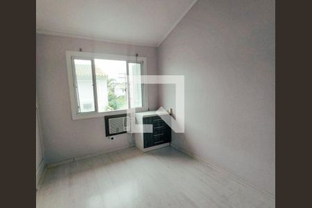 Quarto 2 de casa de condomínio para alugar com 2 quartos, 88m² em Rio Branco, Canoas