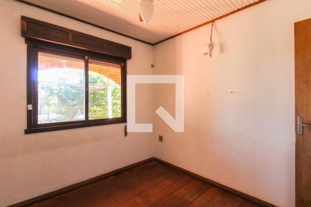 Quarto 1 de casa para alugar com 3 quartos, 120m² em Guajuviras, Canoas