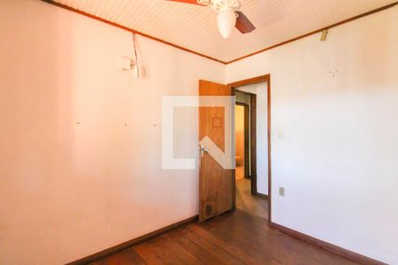 Quarto 1 de casa para alugar com 3 quartos, 120m² em Guajuviras, Canoas