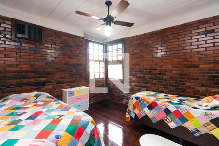 Quarto 1 de casa para alugar com 4 quartos, 288m² em Guarujá, Porto Alegre