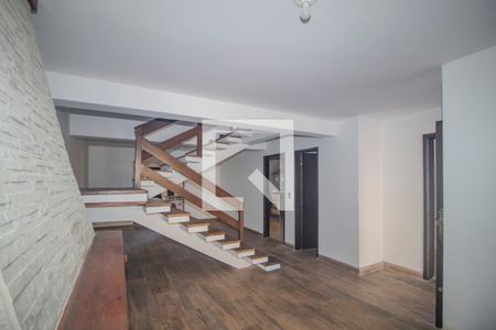 Sala de casa à venda com 3 quartos, 220m² em Guarujá, Porto Alegre