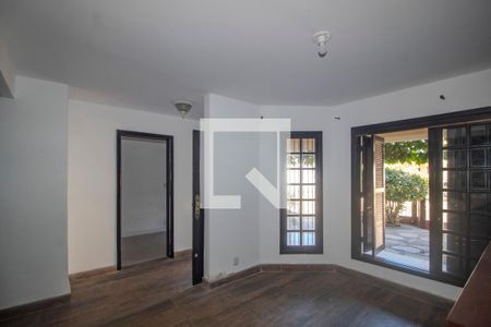 Sala de casa à venda com 3 quartos, 220m² em Guarujá, Porto Alegre