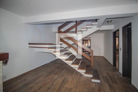 Sala de casa à venda com 3 quartos, 220m² em Guarujá, Porto Alegre