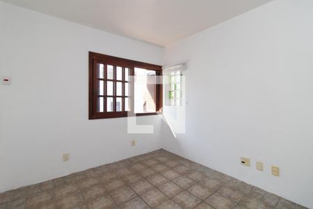 Quarto 1 de casa para alugar com 3 quartos, 400m² em Jardim Botânico, Porto Alegre