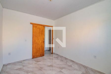 Quarto 1 de casa para alugar com 2 quartos, 65m² em Mário Quintana, Porto Alegre