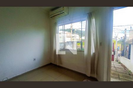 Sala  de casa à venda com 2 quartos, 110m² em Guarujá, Porto Alegre
