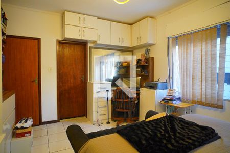 Suíte  de casa à venda com 3 quartos, 300m² em Cristo Redentor, Porto Alegre
