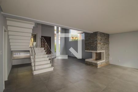 Sala de casa de condomínio à venda com 4 quartos, 286m² em Vila Nova, Porto Alegre