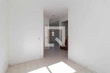 Sala de casa de condomínio à venda com 3 quartos, 161m² em Guarujá, Porto Alegre