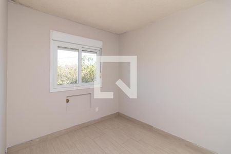 Quarto 1 de apartamento para alugar com 2 quartos, 48m² em Restinga, Porto Alegre