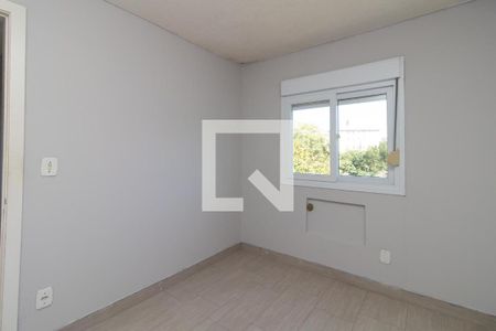 Quarto 1 de apartamento para alugar com 2 quartos, 48m² em Restinga, Porto Alegre
