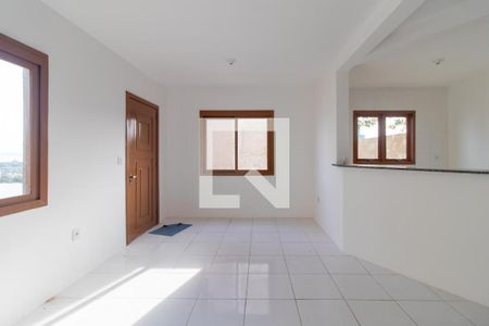 Sala de casa de condomínio à venda com 2 quartos, 130m² em Ipanema, Porto Alegre