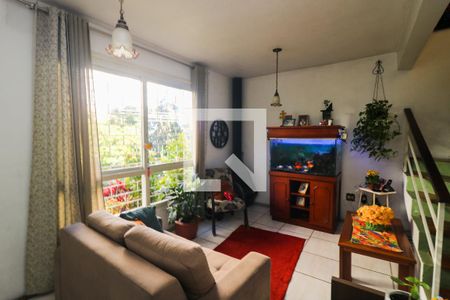 Sala de casa de condomínio à venda com 3 quartos, 157m² em Santo Antônio, Porto Alegre