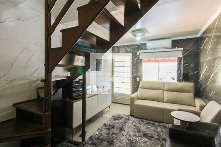 Sala de casa de condomínio à venda com 2 quartos, 60m² em Rio Branco, Canoas