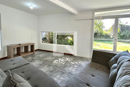 Sala de casa para alugar com 3 quartos, 210m² em  Campeche, Florianópolis