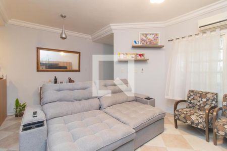 Sala de casa à venda com 3 quartos, 116m² em Guarujá, Porto Alegre