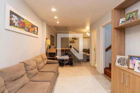 Sala de casa à venda com 3 quartos, 116m² em Guarujá, Porto Alegre