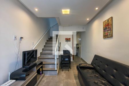 Sala  de casa de condomínio para alugar com 2 quartos, 60m² em Vila Caiçara, Praia Grande