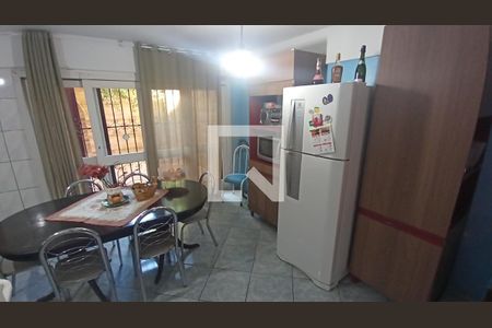 Cozinha de casa de condomínio à venda com 3 quartos, 100m² em Espírito Santo, Porto Alegre