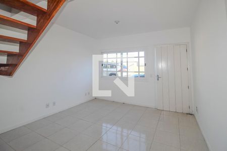 Sala de casa de condomínio à venda com 2 quartos, 99m² em Campo Novo, Porto Alegre
