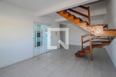 Sala de casa de condomínio à venda com 2 quartos, 99m² em Campo Novo, Porto Alegre